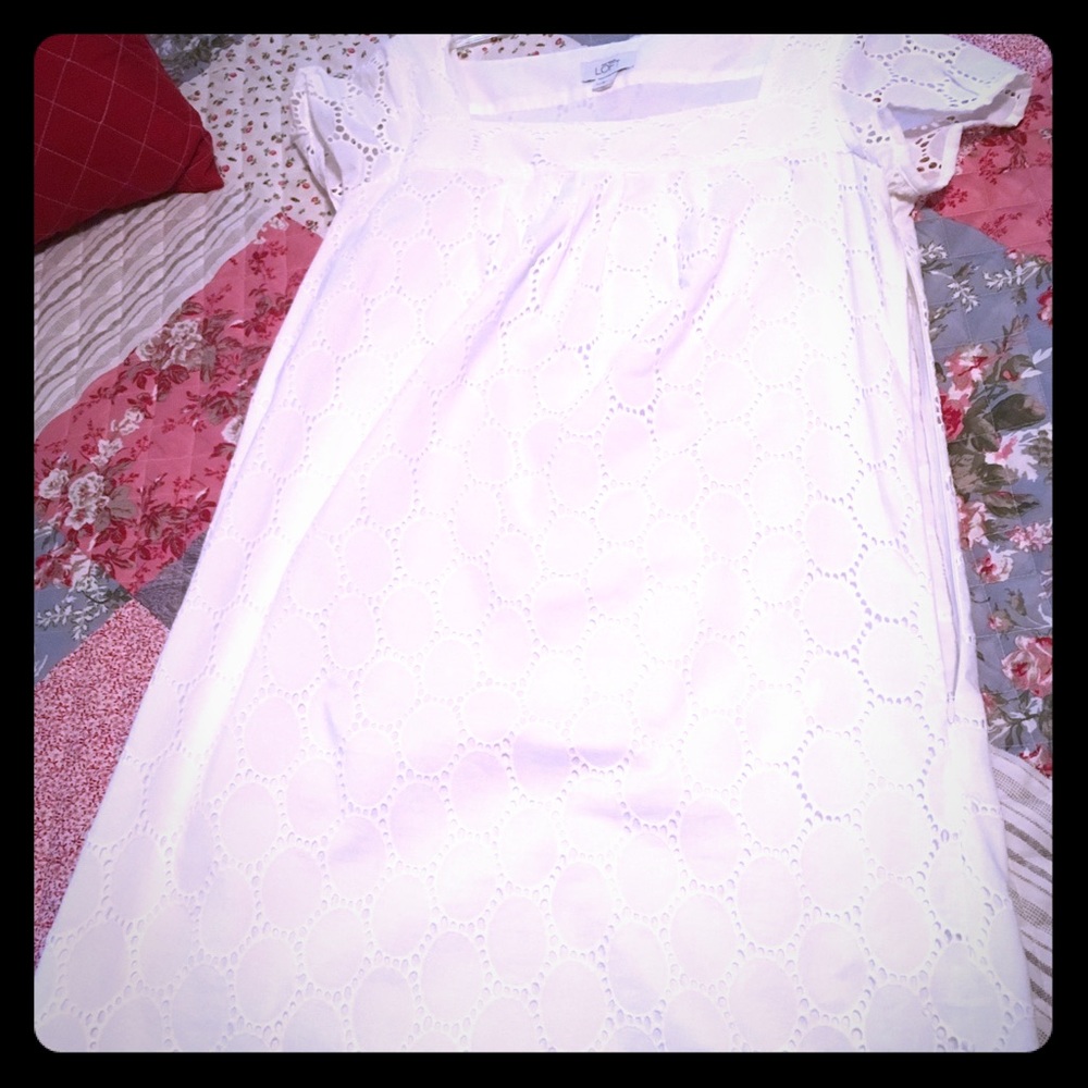 White eyelet short sleeved knee length dress